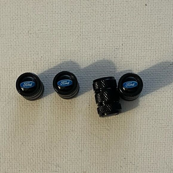Ford valve Stem caps in Black set of 4 NWT - Picture 1 of 4
